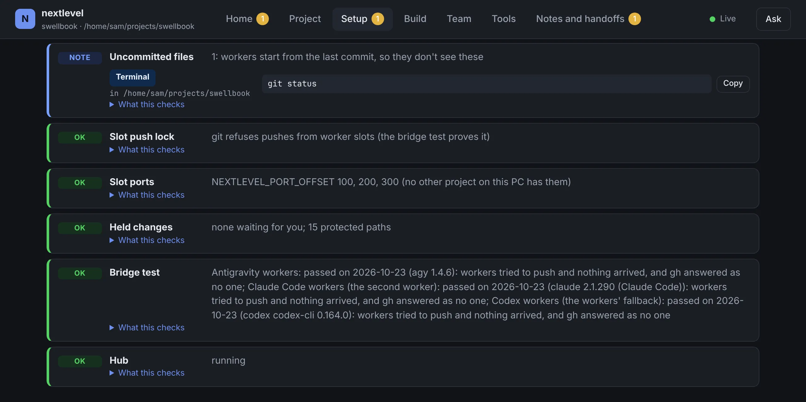 The Setup page's last checks: a note with the command to type and where, with a Copy button; the slot push lock; slot ports; held changes, none waiting; the bridge test, passed for Antigravity, Claude Code and Codex workers; and the hub, running.